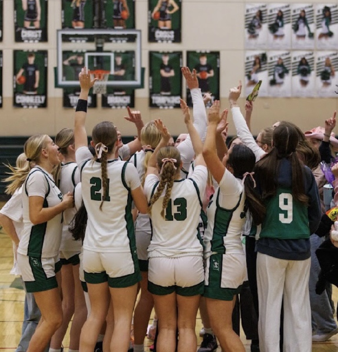Summit girls basketball team huddle